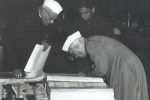 Jawaharlal Nehru signing the Indian Constitution, 1950