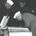 Jawaharlal Nehru signing the Indian Constitution, 1950